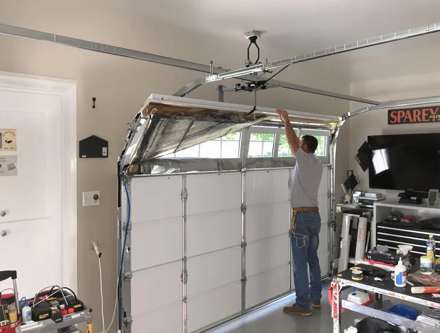 Garage door section replacement by Windsor Garage Door Repair in Windsor