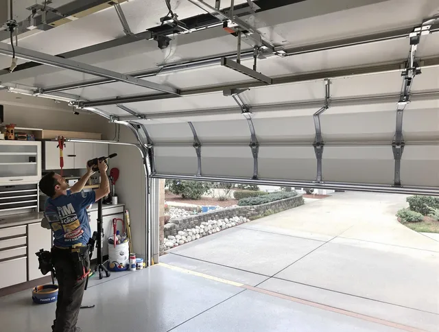 Garage door track repair service by Windsor Garage Door Repair in Windsor